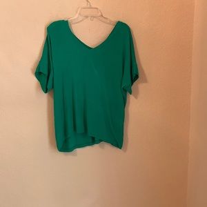 CAbi Field Tee (Item 5927).  Kelly Green, V neckline front and back, knit.
